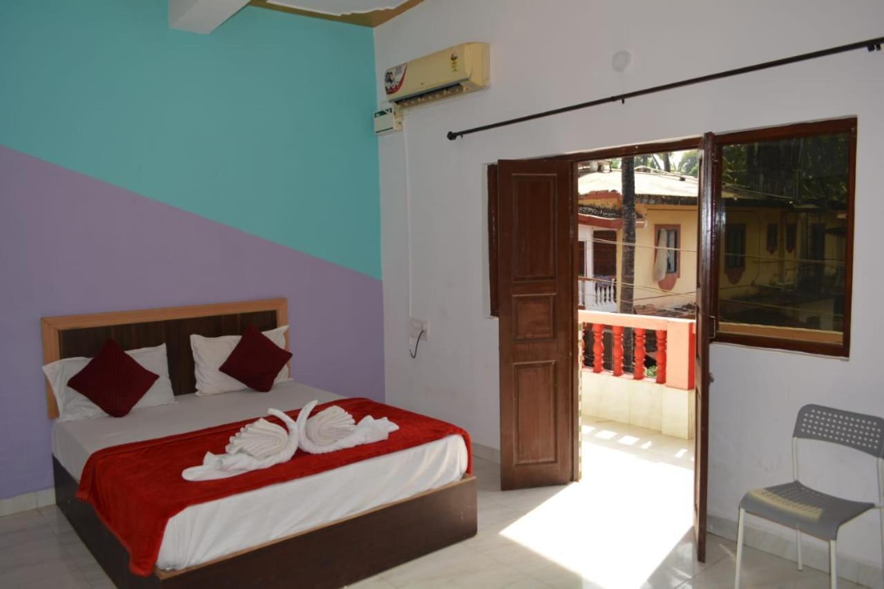 Esther Guest House Калангут Номер фото