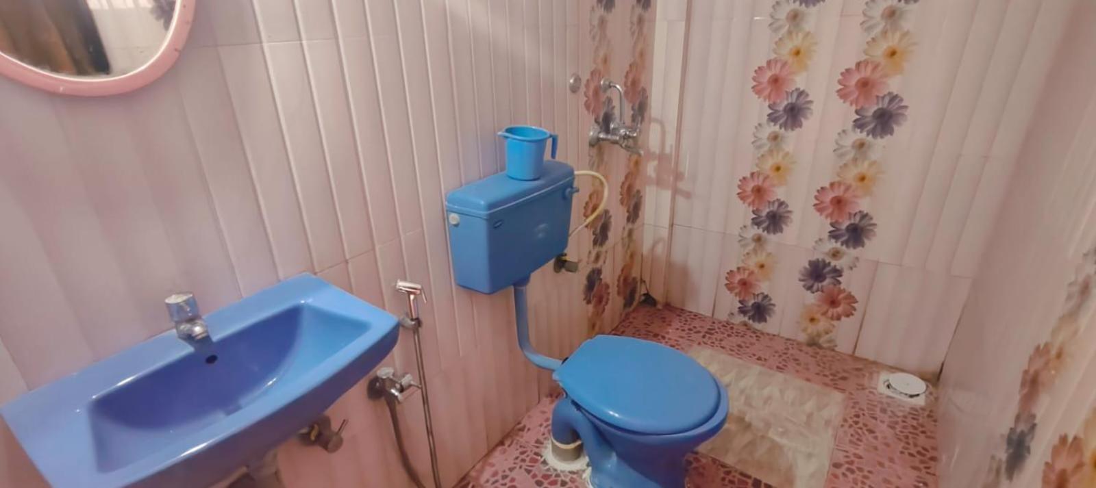 Esther Guest House Калангут Номер фото