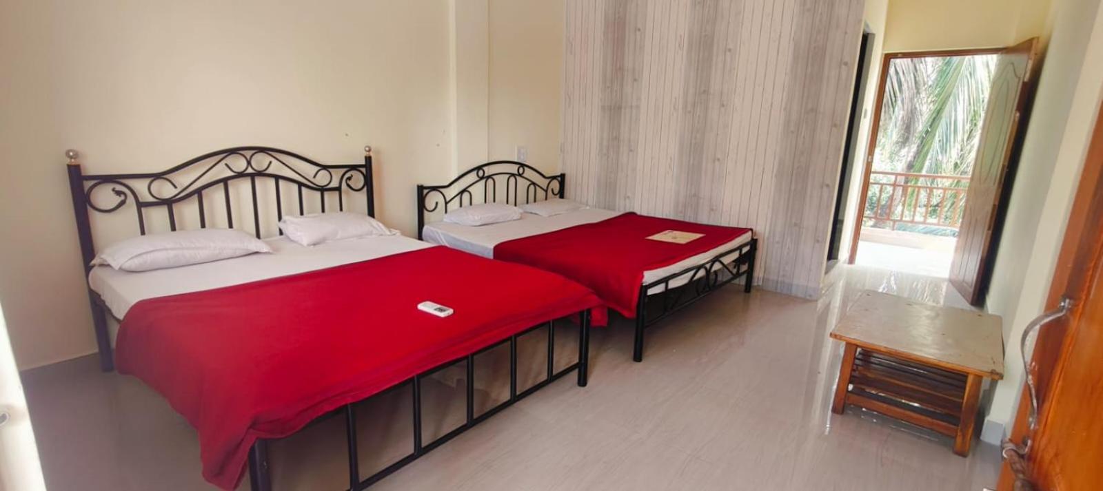 Esther Guest House Калангут Номер фото