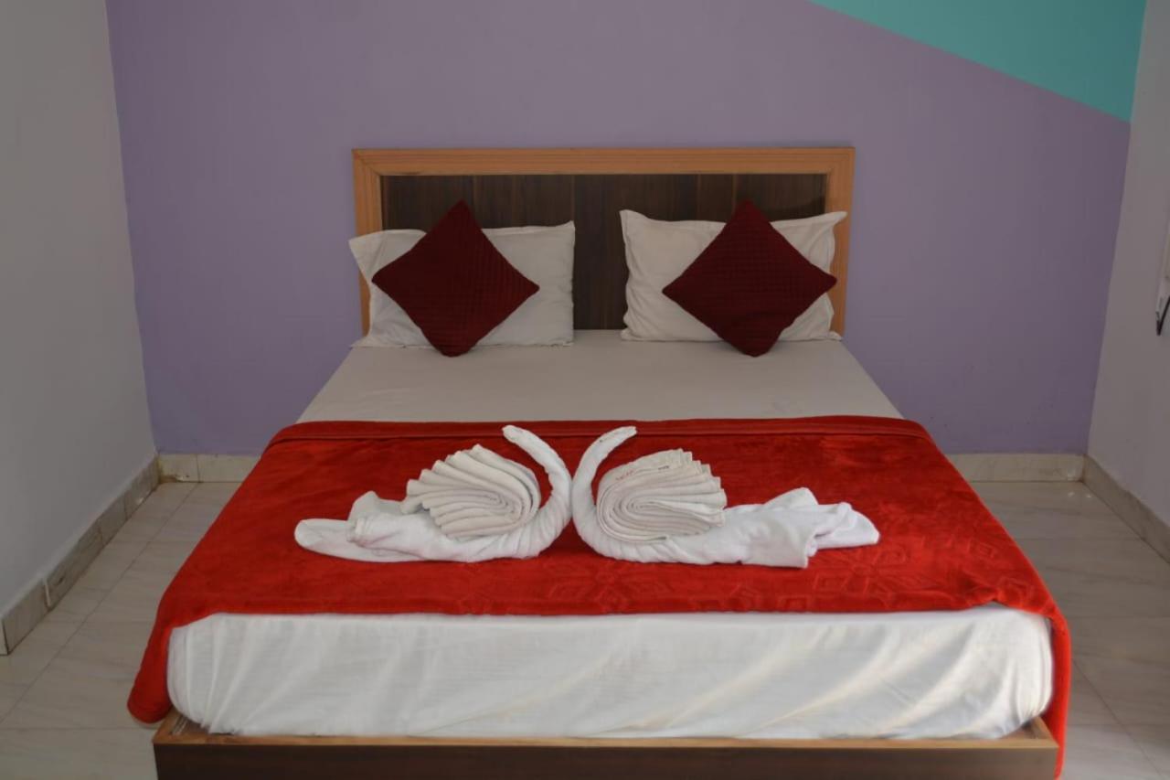 Esther Guest House Калангут Номер фото